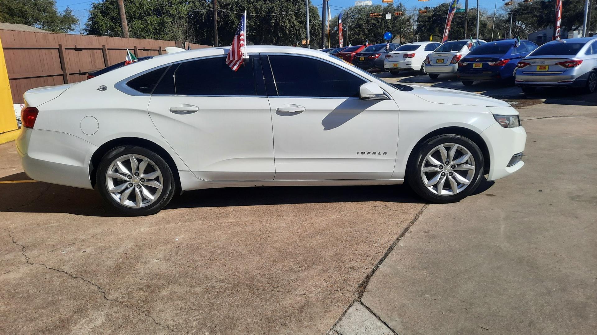 2017 Chevrolet Impala (2G1105S32H9) , located at 16710 Clay Rd., Houston, TX, 77084, (281) 859-7900, 29.834864, -95.656166 - Photo#0